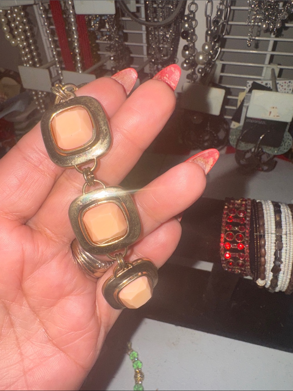 Gold-Tone Bracelet with Peach Resin Accents